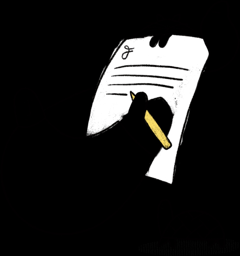 Someone working through a pile of printed documents